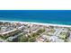 Stunning aerial view of a vibrant coastal community near the beach, offering a desirable lifestyle at 516 Parkdale Mews # 516, Venice, FL 34285