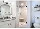Updated bathroom featuring new shower with glass door, countertop, toilet, and accessories at 516 Parkdale Mews # 516, Venice, FL 34285