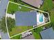 The aerial shot highlights the home's spacious backyard, pool, and overall property layout at 5419 Lakehurst Ct, Palmetto, FL 34221