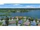 This aerial view captures the home’s proximity to the lake and the surrounding neighborhood at 5419 Lakehurst Ct, Palmetto, FL 34221