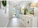 Welcoming entryway featuring stylish decor, ample lighting, and an inviting view through the front door at 5419 Lakehurst Ct, Palmetto, FL 34221