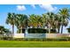 The 'Sunrise Preserve at Palmer Ranch' sign is surrounded by manicured landscaping at 5750 Long Shore Loop, Sarasota, FL 34238