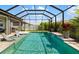 Beautiful pool features lounge chairs, sparkling water, and a tranquil setting at 5750 Long Shore Loop, Sarasota, FL 34238