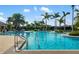Large community swimming pool with shallow end and lap lane at 5750 Long Shore Loop, Sarasota, FL 34238