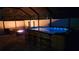 Illuminated hot tub area at night with a bar and seating creating a relaxing atmosphere at 5802 Alabaster Stone Ln, Apollo Beach, FL 33572