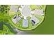 Aerial view of house with lake view, surrounding landscape, and other houses at 5910 Hevena Ct, Palmetto, FL 34221