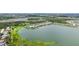 Spacious lakefront home surrounded by lush greenery and serene water views in a Gathering-friendly neighborhood at 5910 Hevena Ct, Palmetto, FL 34221