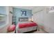 Modern bedroom featuring colorful decor, comfortable furnishings, and ample storage at 5910 Hevena Ct, Palmetto, FL 34221