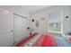 Bedroom featuring natural light, closet with sliding doors and modern decor at 5910 Hevena Ct, Palmetto, FL 34221