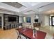 Clubhouse lounge area with bar, tv, ample seating, and open floor plan, perfect for gatherings at 5910 Hevena Ct, Palmetto, FL 34221