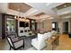 Clubhouse lounge area showcasing sofas with throw pillows, modern lighting, and a media center at 5910 Hevena Ct, Palmetto, FL 34221