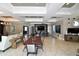 Clubhouse lounge area featuring multiple seating areas, tables, and a modern design with recessed lighting at 5910 Hevena Ct, Palmetto, FL 34221