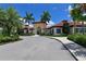 Beautiful community clubhouse with lush landscaping and a welcoming entrance at 5910 Hevena Ct, Palmetto, FL 34221