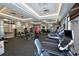 Well-equipped gym with state-of-the-art treadmills, weights, and fitness machines for a complete workout at 5910 Hevena Ct, Palmetto, FL 34221