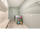 Functional laundry room with washer, dryer, and ample storage space at 5910 Hevena Ct, Palmetto, FL 34221