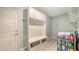 Inviting mudroom with built-in storage and convenient access to laundry area at 5910 Hevena Ct, Palmetto, FL 34221