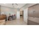Cozy office space with tile floors, neutral paint and a doorway to the house at 5910 Hevena Ct, Palmetto, FL 34221