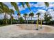 A community splash pad area with colorful water features and surrounding landscaping at 5910 Hevena Ct, Palmetto, FL 34221