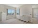 Bright bedroom featuring ample natural light, neutral decor, and carpet flooring at 610 Riviera Dunes Way # 306, Palmetto, FL 34221