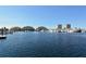 Expansive waterfront view showing docks, boats, and condos on a sunny day at 610 Riviera Dunes Way # 306, Palmetto, FL 34221