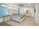 Bright primary bedroom with a king-sized bed, stylish nightstands, and ample natural light at 627 Avenida Del Norte, Sarasota, FL 34242