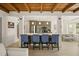 Stylish kitchen featuring an open layout, island with bar seating, and adjacent dining area at 627 Avenida Del Norte, Sarasota, FL 34242