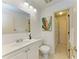 Bathroom featuring a large mirror, vanity, and walk-in shower at 6840 Midnight Pass Rd # 6840, Sarasota, FL 34242