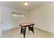 Bonus room with an air hockey table and neutral decor, great for fun and games at 6840 Midnight Pass Rd # 6840, Sarasota, FL 34242