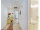 Upstairs hallway with views to bathroom and bedrooms and decorative touches at 6840 Midnight Pass Rd # 6840, Sarasota, FL 34242