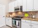 Well-equipped kitchen with stainless steel appliances and custom cabinetry at 6851 Bay Hill Dr, Lakewood Ranch, FL 34202