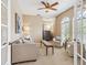 Cozy living room with neutral tones, comfortable seating, and plenty of natural light at 6851 Bay Hill Dr, Lakewood Ranch, FL 34202
