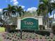 Tara Golf and Country Club private community sign surrounded by beautiful landscaping and palm trees at 6908 Stoneywalk Ct, Bradenton, FL 34203