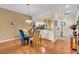 Comfortable dining room next to an open kitchen, with natural light and inviting atmosphere at 6908 Stoneywalk Ct, Bradenton, FL 34203