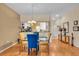 Open concept dining area with views to the kitchen and the front entry at 6908 Stoneywalk Ct, Bradenton, FL 34203