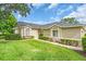 Attractive home with a well-manicured lawn and lush landscaping at 6908 Stoneywalk Ct, Bradenton, FL 34203