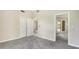 Spacious bedroom with doors leading to the outside at 7404 Weeping Willow Blvd, Sarasota, FL 34241