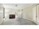 Bedroom featuring neutral walls and carpet, plus a window and a door to a balcony at 7404 Weeping Willow Blvd, Sarasota, FL 34241