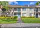 Beautiful condo building with well-kept lawns, stairs to upper units, and lovely doors at 7866 Eagle Creek Dr # 7866, Sarasota, FL 34243