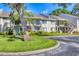Charming condo exterior featuring well-maintained landscaping and a welcoming entrance at 7866 Eagle Creek Dr # 7866, Sarasota, FL 34243