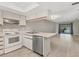 Open floorplan from kitchen provides an easy view to the living room with its open and airy space at 7866 Eagle Creek Dr # 7866, Sarasota, FL 34243