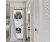 The laundry closet conveniently connects to a bathroom and a second closet for extra storage space at 7866 Eagle Creek Dr # 7866, Sarasota, FL 34243