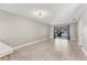 Bright living room featuring hard wood floors, neutral colors, and a sliding door to a porch at 7866 Eagle Creek Dr # 7866, Sarasota, FL 34243