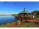 A lakeside gazebo on a pier, inviting residents to enjoy tranquil moments in the community at 8102 Waterview Blvd, Lakewood Ranch, FL 34202