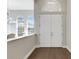 Bright foyer with double entry doors, hardwood floors, and high ceilings at 8102 Waterview Blvd, Lakewood Ranch, FL 34202