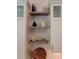 Kitchen decor featuring decorative shelving, backsplash, and accessories at 8102 Waterview Blvd, Lakewood Ranch, FL 34202