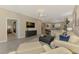 Open concept living room connects to kitchen and dining areas, creating an inviting and spacious atmosphere at 8417 Karpeal Dr # 4, Sarasota, FL 34238