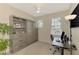 Bright office space featuring built-in storage and a desk area at 8417 Karpeal Dr # 4, Sarasota, FL 34238
