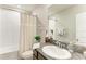 Bathroom showcasing a sink vanity with granite countertops and a shower with a tub at 8676 Ice Wine St, Sarasota, FL 34238