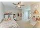 Bright bedroom with a fun design, a comfy bed, and decorative storage at 8676 Ice Wine St, Sarasota, FL 34238