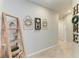 Hallway with decorative shelving and home decor at 8676 Ice Wine St, Sarasota, FL 34238